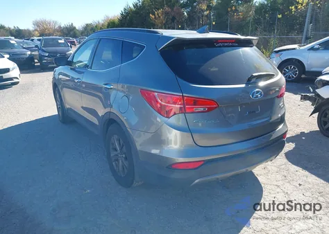 2014 Hyundai Santa Fe Sport 2.4L z USA, uszkodzony, nr VIN 5XYZUDLB4EG212076